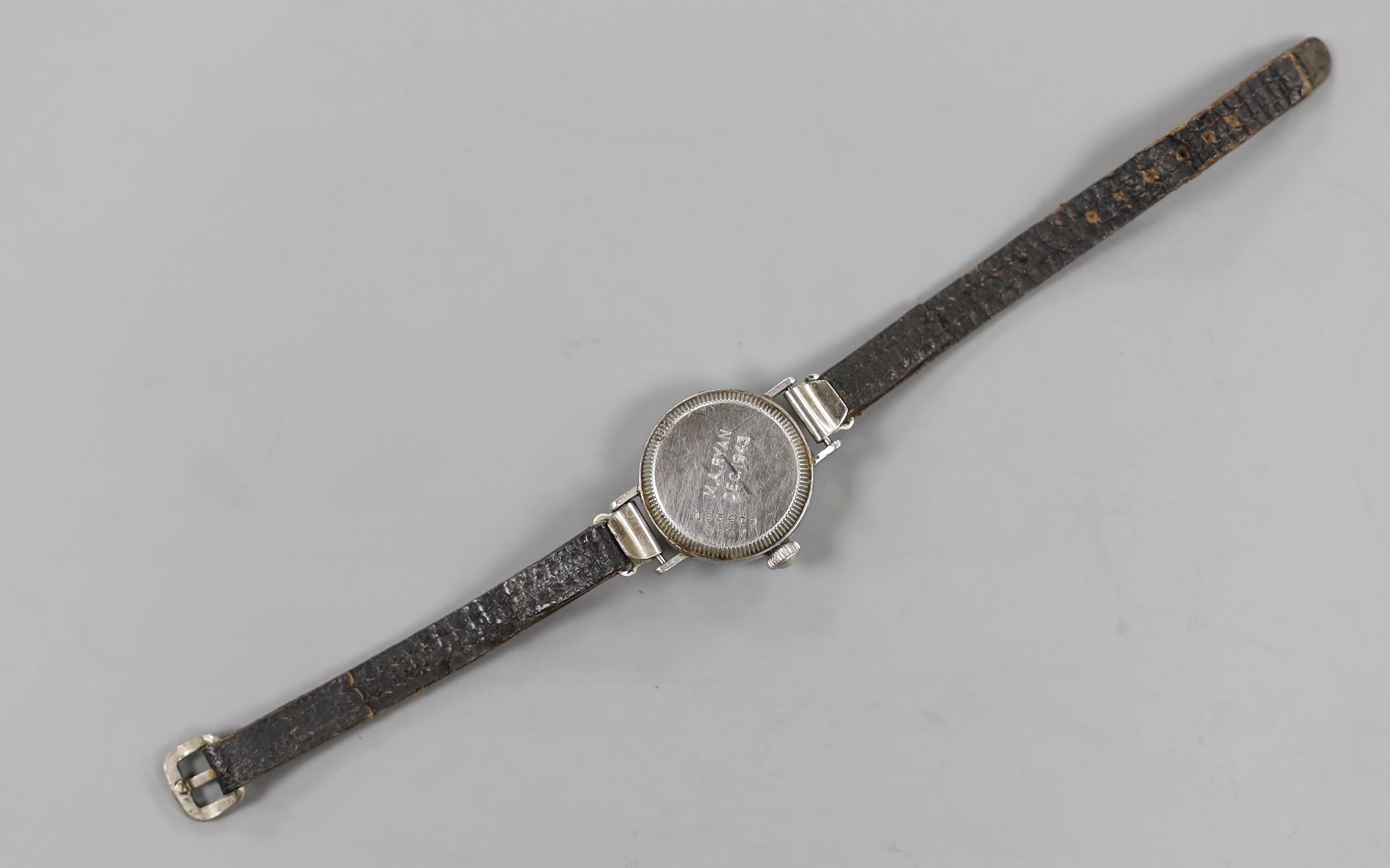 A lady's 1940's stainless steel Rolex Oyster Precision manual wind wrist watch, on associated strap, case diameter 24mm.